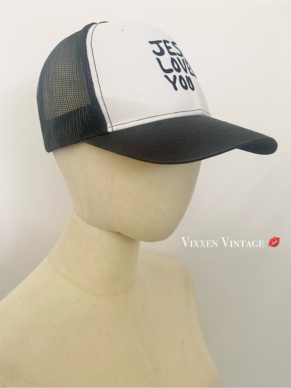 RICHARDSON 'JESUS LOVES YOU' EMBROIDERED MESH TRUCKER HAT IN BLACK/WHITE